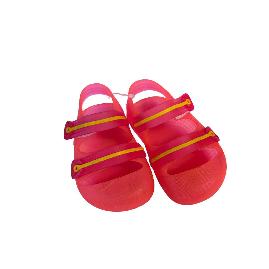 Pair of production overstock physiological fisherman sandals, translucent red with yellow straps