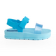 Blue Moderniña platform sandal for girls with a glittery strap and hook-and-loop closure, side view, non-slip sole