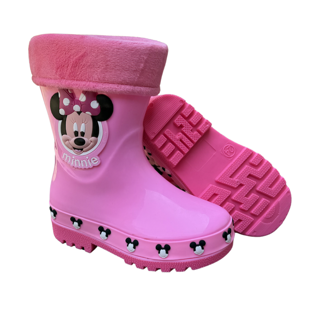 Par de botas Minnie Face rosa para niña, con la cara de Minnie y borde de peluche rosado, una de lado y otra por la suela