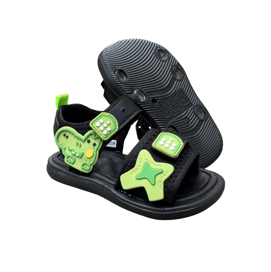 Pair of green Coco Star sandals for boys, with star and dice appliqués and fastening straps