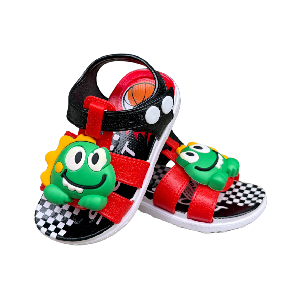 Pair of red Dino Baby sandals for boys, with green dinosaurs on the front and a checkered insole