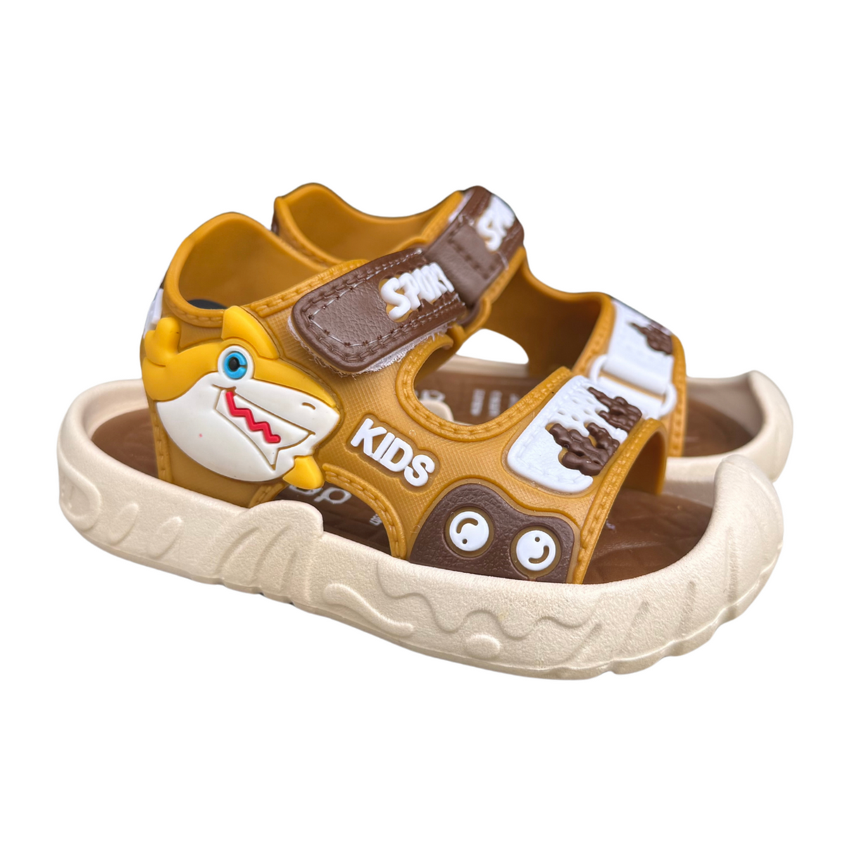 Pair of beige Shark sandals for boys, with a shark and a “Sport” hook-and-loop strap, protective toe cap, non-slip sole, cushioned