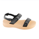 Women's black Sienna platform sandal with black straps and a heel strap, side view