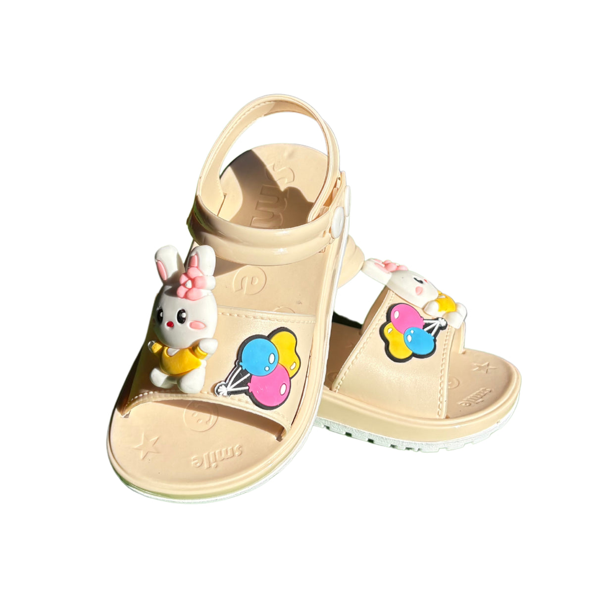 Pair of beige Troop Rabbit sandals for girls, with a bunny and balloons on the front and a heel strap