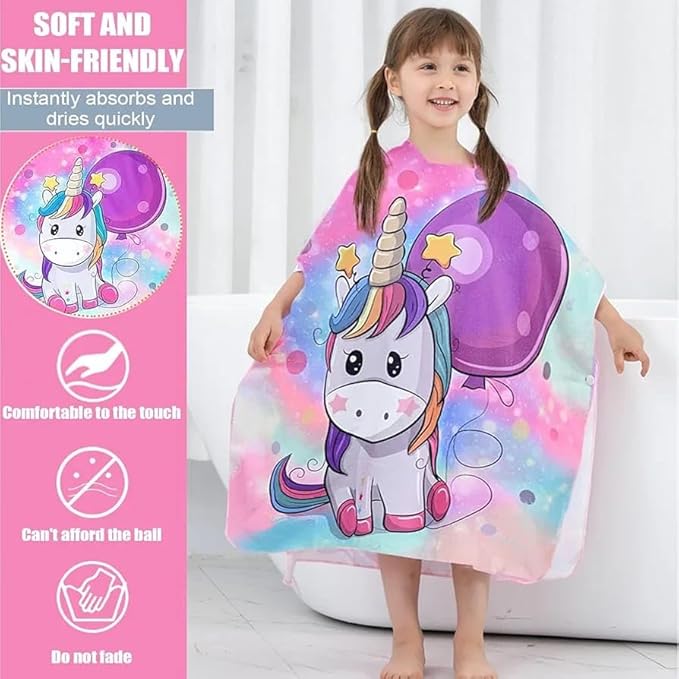 Girl wearing the unicorn and balloon poncho towel, soft and quick-drying