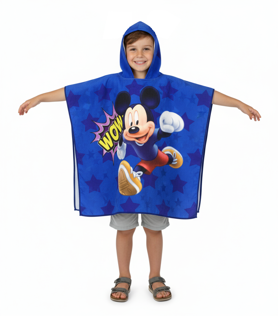 Boy wearing the Mickey poncho towel, blue with stars and Mickey, hooded, in microfiber