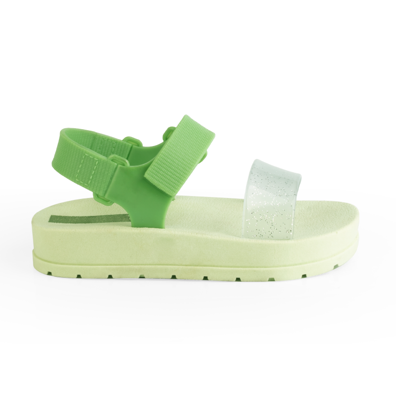 Green Moderniña platform sandal for girls with a glittery strap and hook-and-loop closure, side view, non-slip sole